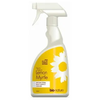 Spray bottle of bio-nature Lemon Myrtle antibacterial cleaner with yellow label and white flower.