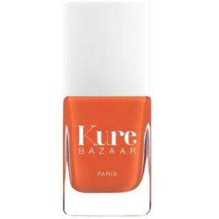 Orange nail polish bottle with "Kure Bazaar Paris" text.