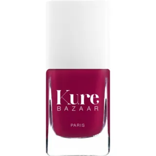 Kure Bazaar Paris nail polish in deep red bottle with white cap.