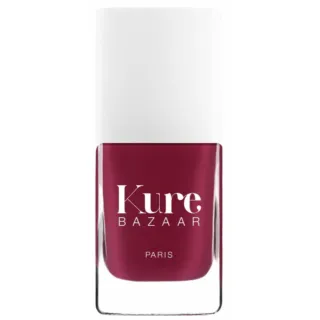 Kure Bazaar nail polish bottle with white cap and red colour.