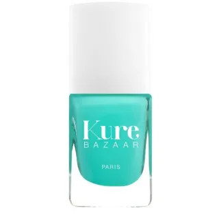 Turquoise nail polish bottle with "Kure Bazaar Paris" text.