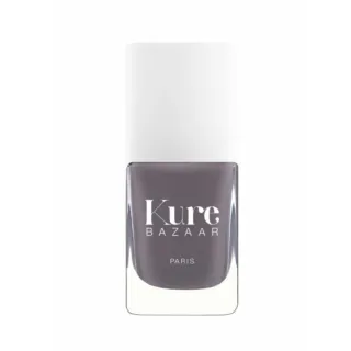 Kure Bazaar nail polish bottle with grey colour and white cap.