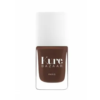 Kure Bazaar brown nail polish bottle with white cap.