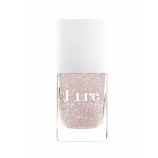 Kure Bazaar glitter nail polish bottle with white cap.