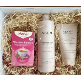 Yogi Tea Women's Balance, Neom body cleanser and polish in a gift box with straw filling.