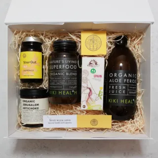 Gift box with supplements: YourGut, Superfood, Aloe Ferox, Artichoke, Epavin, and a "Sent with Love" card.