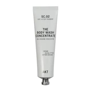 Tube of AKT body wash concentrate with cedar, eucalyptus, and bitter orange.