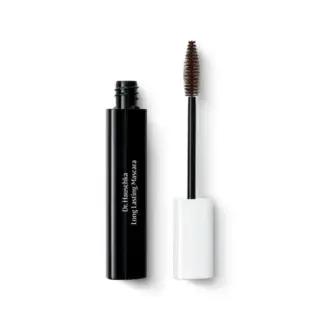Open Dr. Hauschka Long Lasting Mascara with white cap and brown brush.