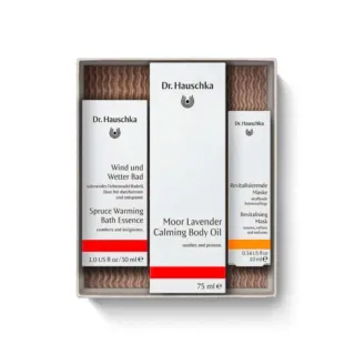 Dr. Hauschka gift set with bath essence, body oil, and revitalising mask in a box.