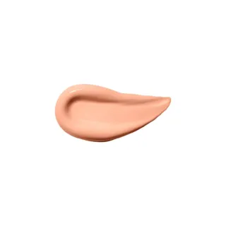 Peach-coloured cream smear on white background.