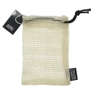 Cream mesh soap bag with black drawstring and "Alter/Native" label.
