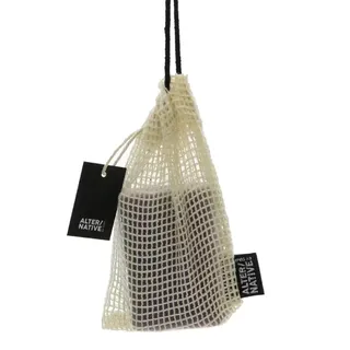 Bar of soap in a mesh bag with "ALTER/NATIVE" label attached.