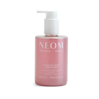 Pink bottle of NEOM Complete Bliss Hand Wash, 300 ml, with pump dispenser.