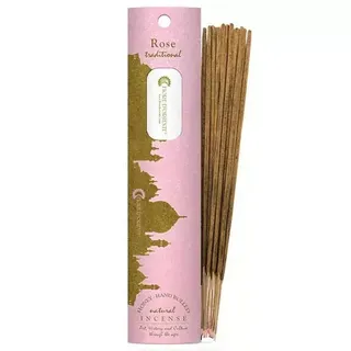 Pink incense packaging with "Rose traditional" text and incense sticks beside it.