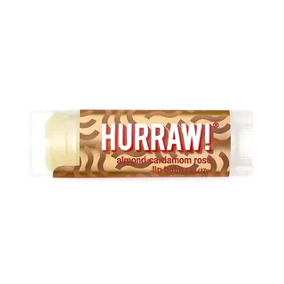 Hurraw! almond cardamom rose lip balm in a patterned tube.