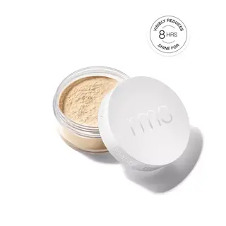 Loose powder in a clear jar with a white lid, labelled "rms beauty". Text: "Visibly reduces shine for 8 hrs".