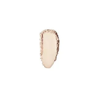 Beige powder swatch with textured edges on a white background.