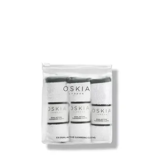Oskia London dual-active cleansing cloths in a clear pouch.