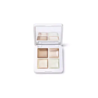 Open compact with four shimmery cream shades and a mirror.