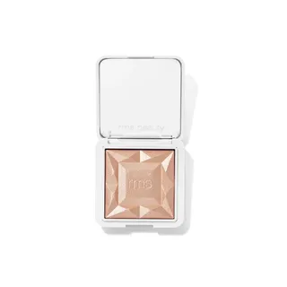 Open compact with embossed peach highlighter and "rms beauty" text.