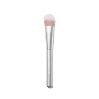 Silver makeup brush with pink bristles on a white background.