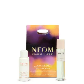 NEOM Sleep Saviours set with bath foam and mist in colourful packaging.