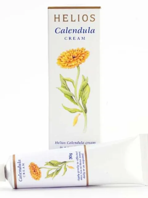 Helios Calendula Cream box and tube with flower illustration.