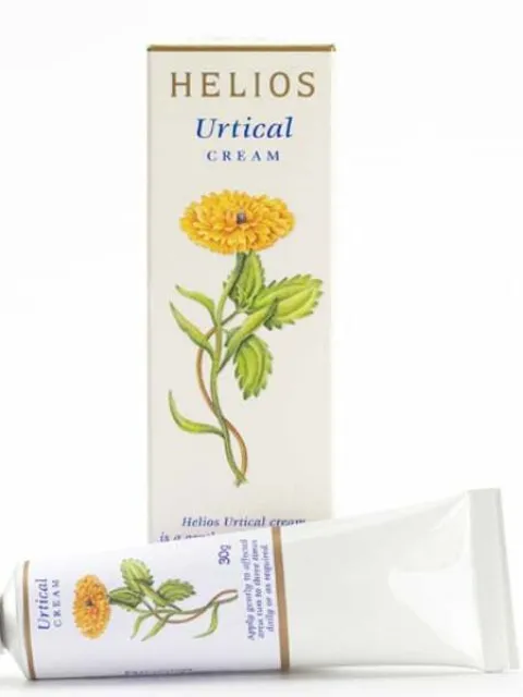Helios Urtical Cream box and tube with yellow flower illustration.