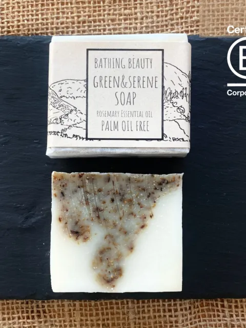 Soap bar and packaging on slate. Text: Bathing Beauty Green & Serene, palm oil free.