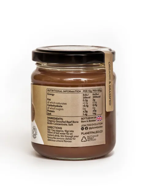 Jar of organic grass-fed beef bone broth with nutritional information and UK flag label.