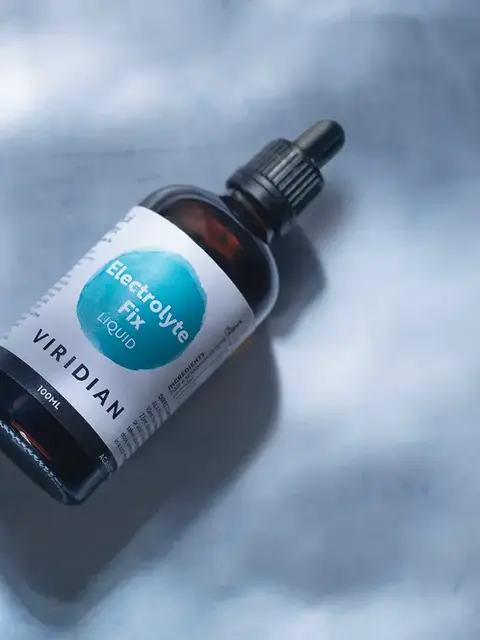 Viridian Electrolyte Fix Liquid bottle with dropper, 100ml, on a light surface.