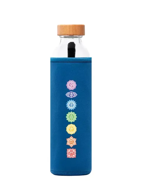 Glass bottle with bamboo lid, blue sleeve, and colourful chakra symbols vertically aligned.