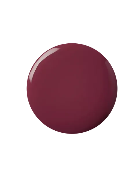 Dark red nail polish swatch on black background.
