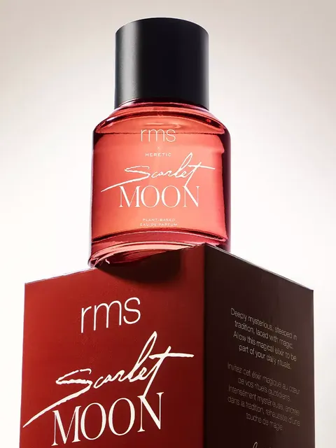 Red bottle of "rms Scarlet Moon" perfume on matching box.