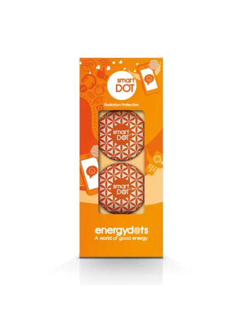 Orange packaging with two smartDOT discs for radiation protection. Text: "energydots".