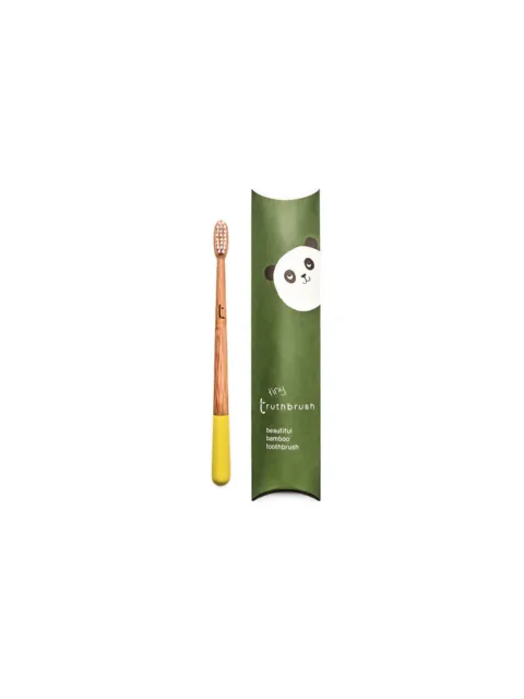 Bamboo toothbrush with yellow tip, green packaging with panda illustration. Text: "tiny truthbrush".