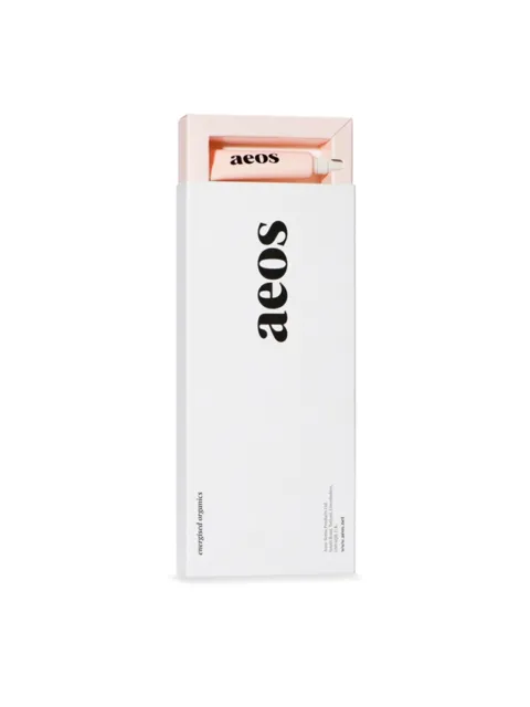 White box with "aeos" text, containing a pink tube.