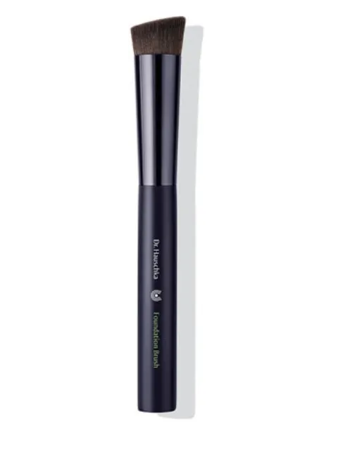 Black foundation brush with angled bristles, labelled "Dr. Hauschka Foundation Brush".