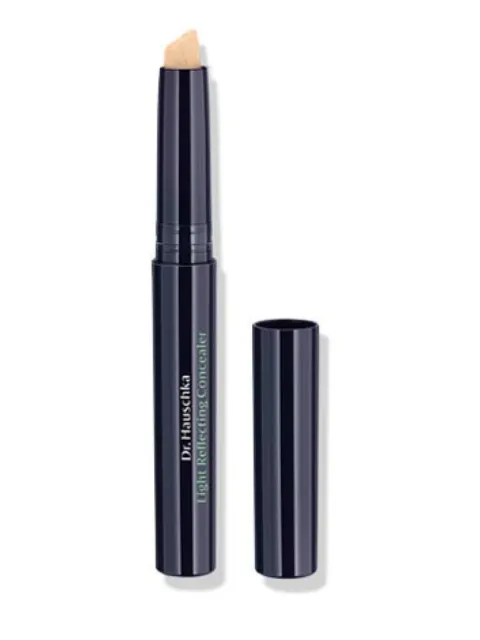 Dark tube of Dr. Hauschka Light Reflecting Concealer with cap removed.