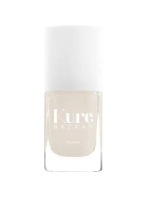 Kure Bazaar nail polish bottle with white cap and beige colour.