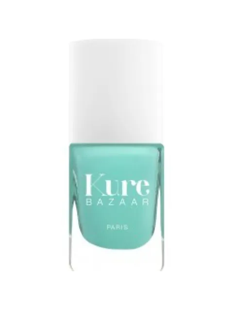 Turquoise nail polish bottle with white cap, labelled "Kure Bazaar Paris".