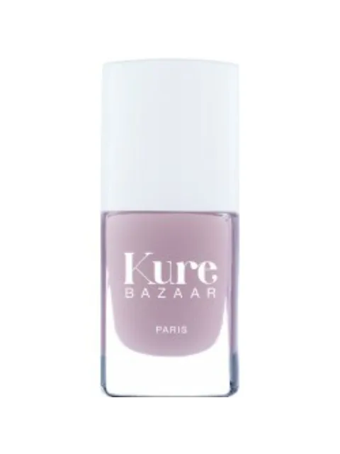 Kure Bazaar nail polish bottle with pink shade and white cap.