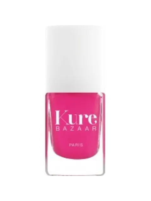 Pink nail polish bottle with "Kure Bazaar Paris" text.