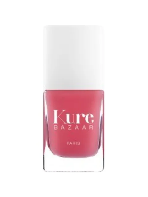 Kure Bazaar pink nail polish bottle with white cap.
