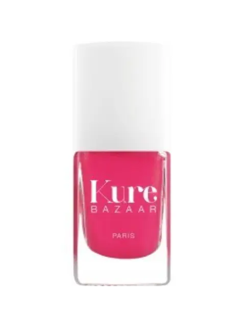 Pink Kure Bazaar nail polish bottle with white cap, labelled "Paris".