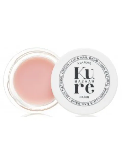 Kure Bazaar Paris lip and nail balm in a round container with a pink tint.