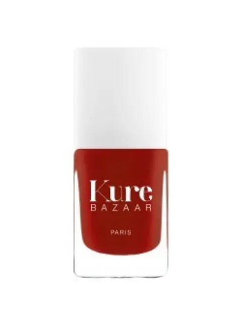 Kure Bazaar red nail polish bottle with white cap.