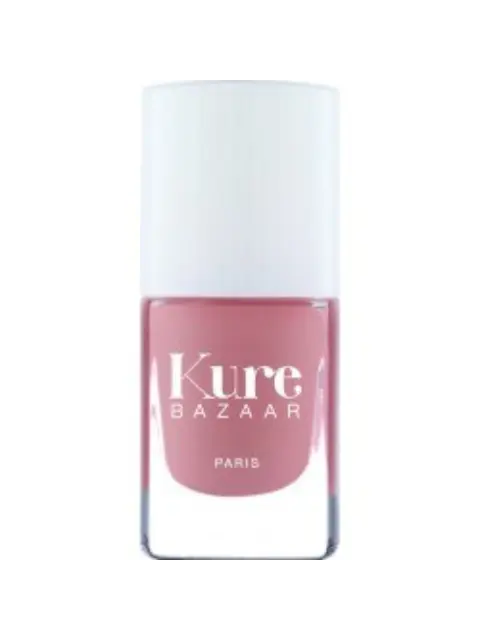 Pink nail polish bottle with "Kure Bazaar Paris" text.