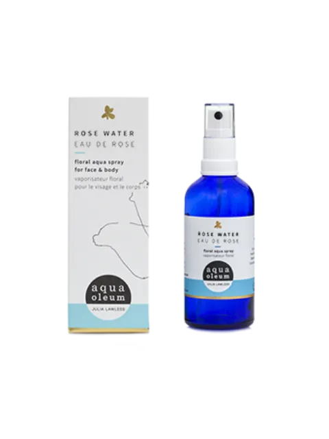 Blue bottle of rose water spray with packaging. Text: "Rose Water Eau de Rose".
