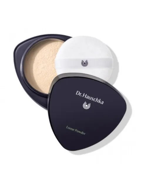 Dr. Hauschka Loose Powder with applicator in a dark triangular container.